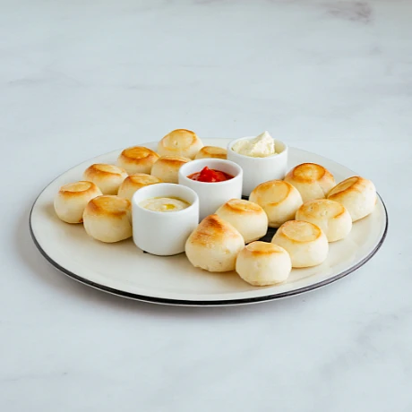 A plate of twelve Vegan Doughballs from PizzaExpress